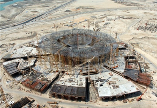 Illustration for article titled Time-Lapse Gallery Of Abu Dhabi's Nearly-Completed Ferrari World Theme Park